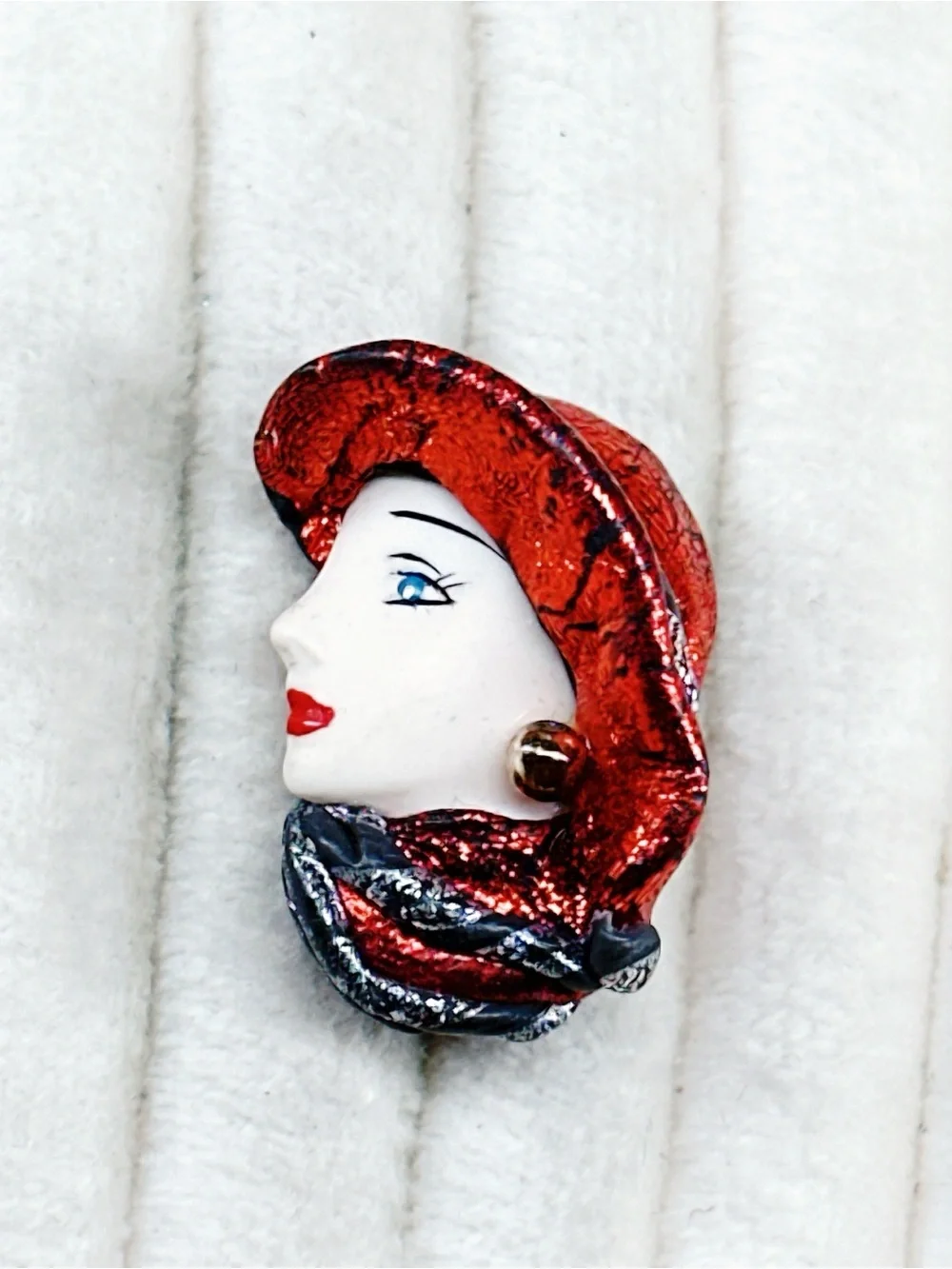 338u. Red Hat Clay Ladyface Brooch